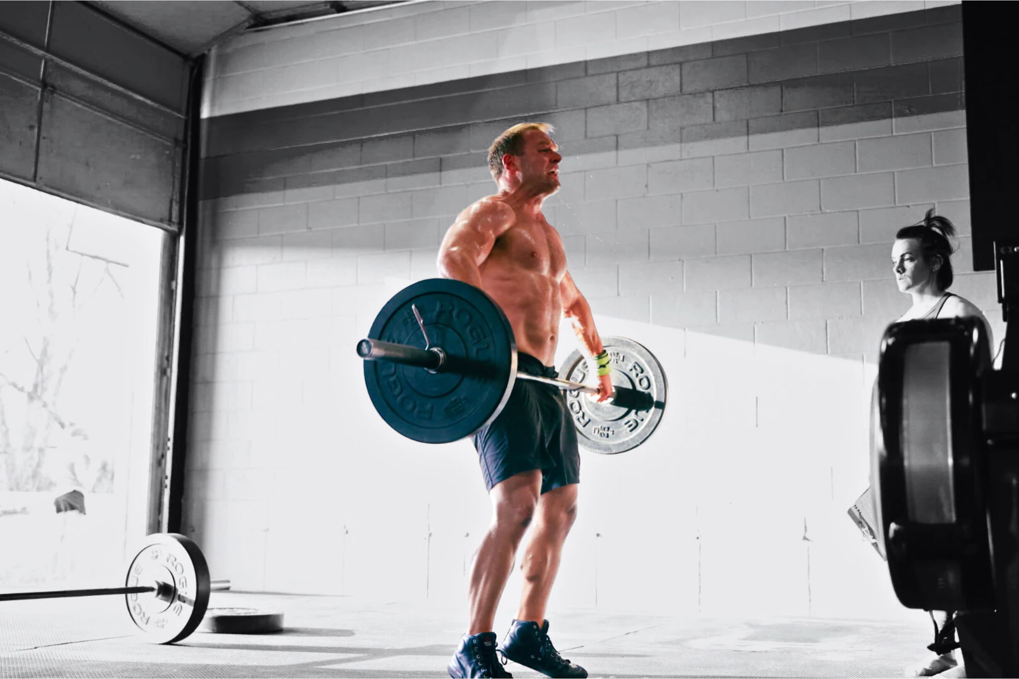 CrossFit Barrington workout with athlete performing a Clean.